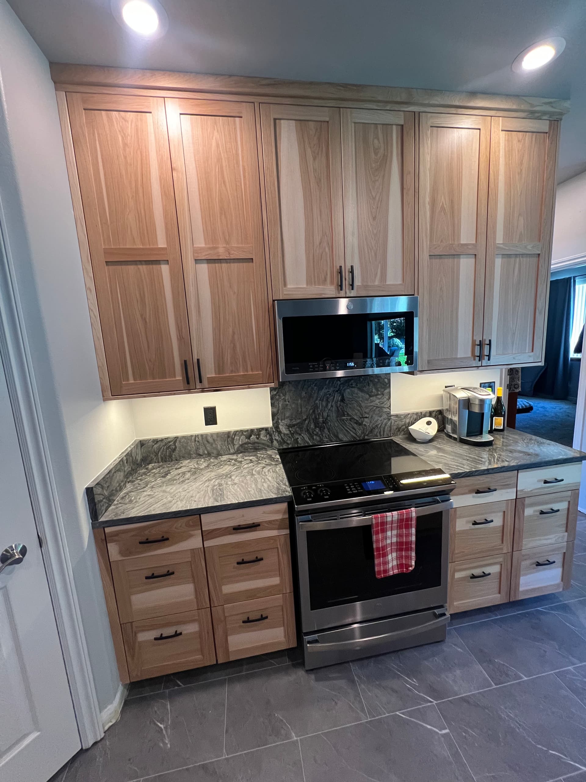 Under-Cabinet Lighting and Black Receptacles That Finish a Kitchen Right image