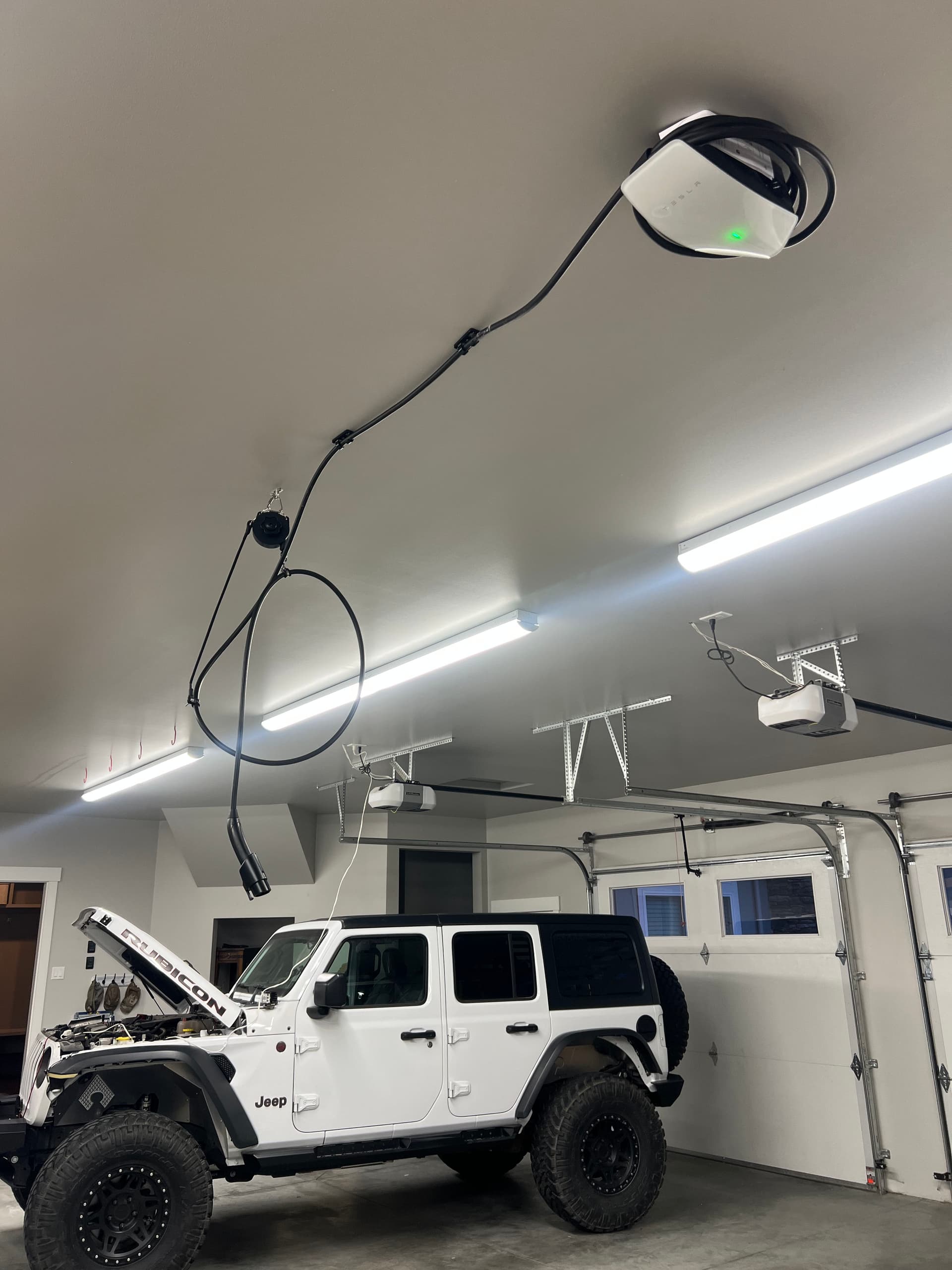 Effortless Garage Upgrade: Introducing Our Ceiling-Mounted EV Charger image
