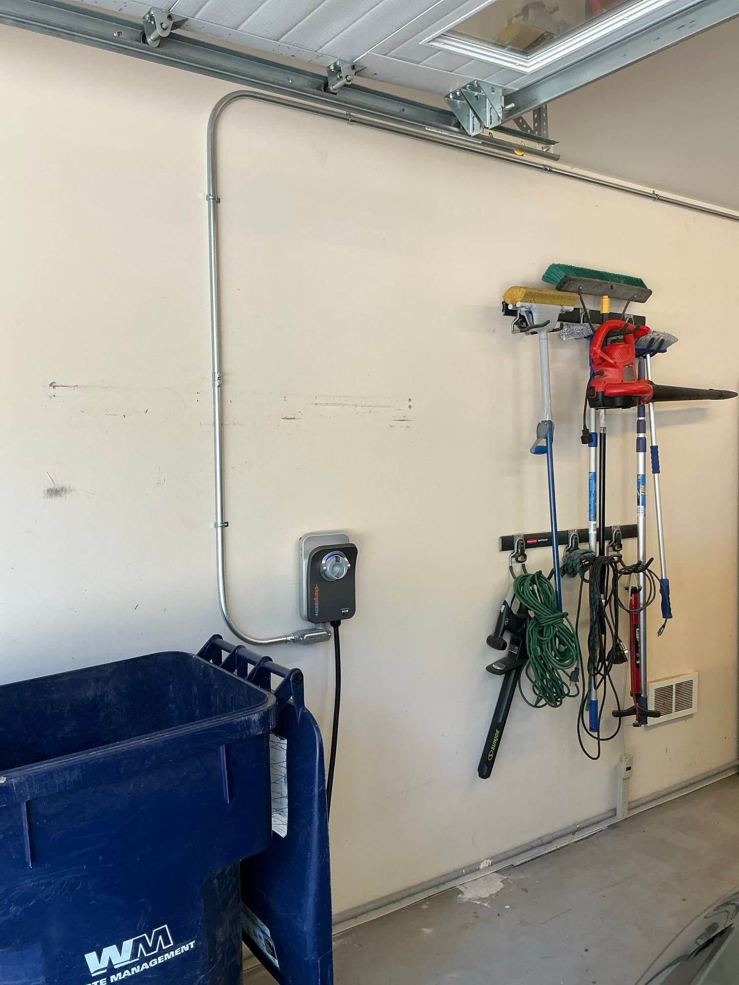 Clean Level 2 EV Charger Install in a Home Garage image